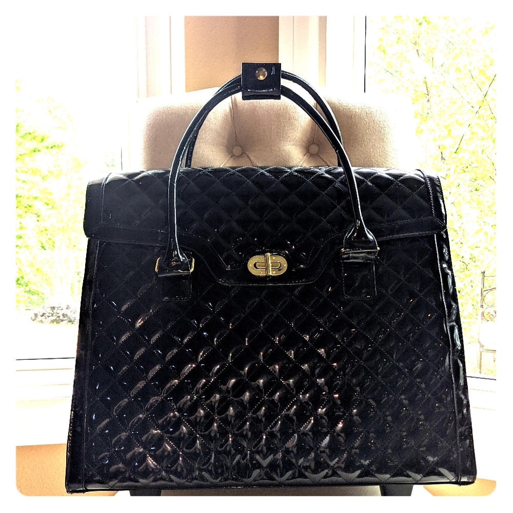 Women's patent leather rolling briefcase.